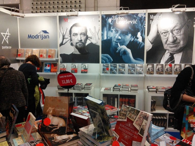 The largest book stand says ‘Buy a book!’